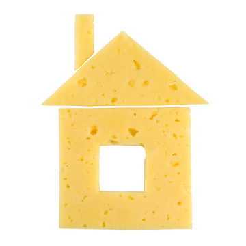 白色背景的奶酪做成的房子