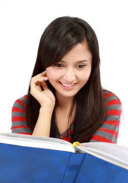 年輕漂亮的女孩讀書畫像