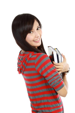 可愛的亞洲女孩拿書