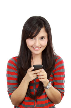漂亮的亞洲女人給朋友發(fā)好消息
