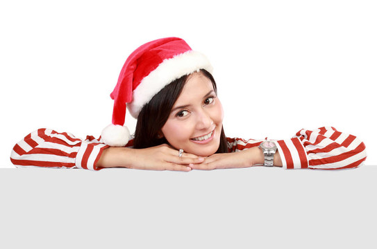 Santa的微笑女人帶著空白的廣告牌