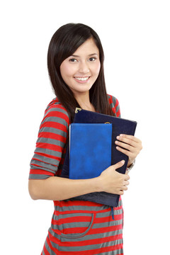 帶著書的年輕女人