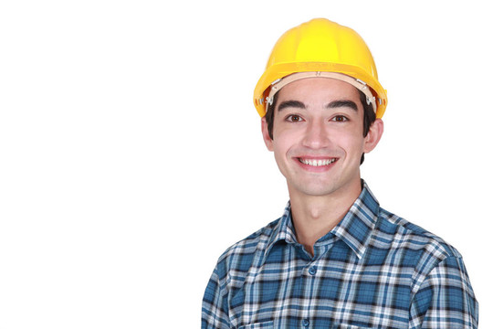 快樂的年輕建筑工人
