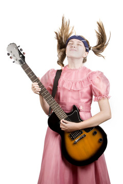 年輕的女孩與一個搖滾guitarplaying搖頭音樂