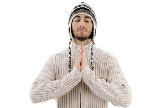 年輕人用手祈禱