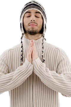 年輕英俊的男子祈禱