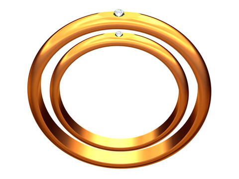 兩個黃金結(jié)婚戒指；一個在其他的。