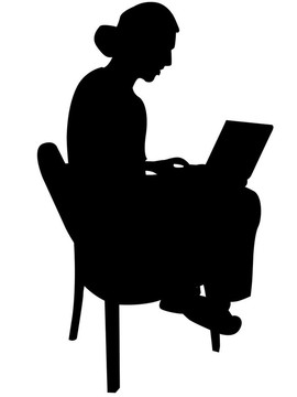男子坐在椅子上筆記本電腦