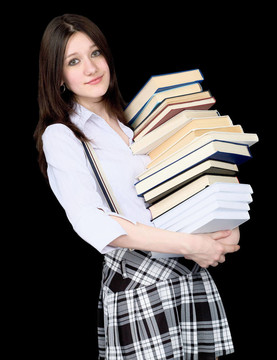 女孩手里拿著一堆書