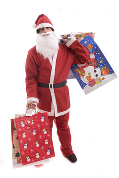 年輕人在Santa服裝；充滿了禮物