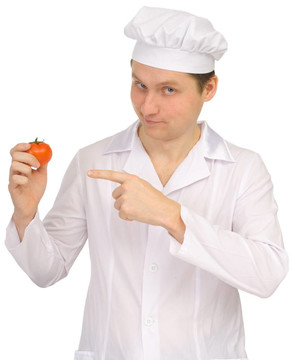Cook手上的西紅柿
