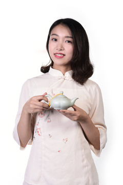 端著茶壺的女人