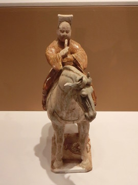 唐代三彩騎馬陶樂(lè)俑