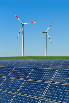 太陽能電池板和風(fēng)力渦輪機(jī)在一個(gè)領(lǐng)域