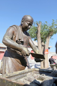 餅子加肉雕塑