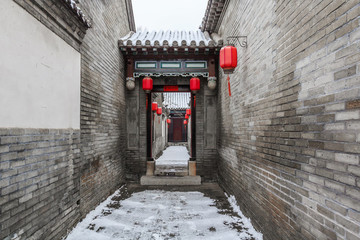 傳統(tǒng)建筑門樓雪景