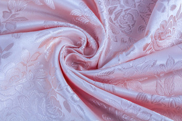 粉红色暗花窗帘布背景