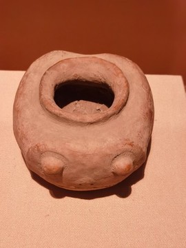 人面形罐