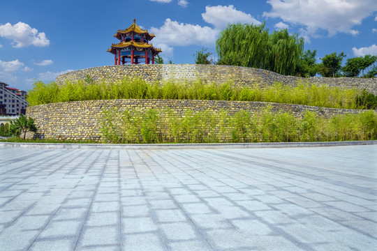 前景是石板路的竹林亭子公園景觀(guān)