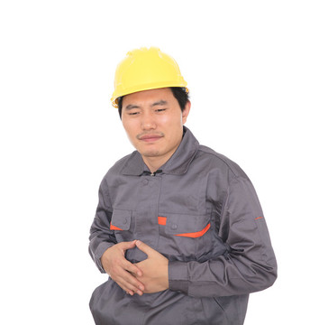 白背景前肚子疼的建筑農(nóng)民工