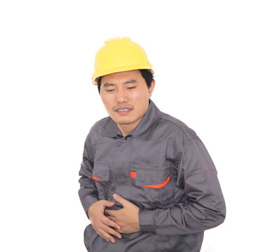 白背景前肚子疼的建筑農(nóng)民工