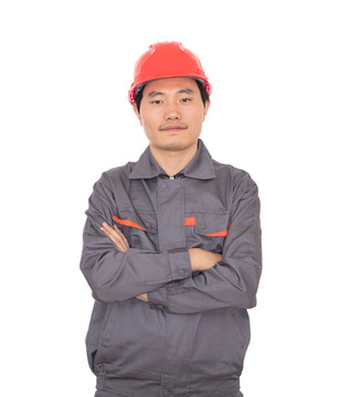 男性工人抱胳膊站在白背景前