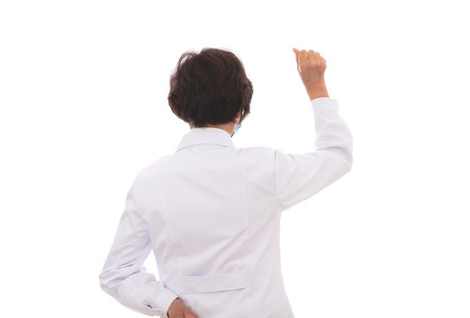 女醫(yī)生握拳舉起右手示意加油