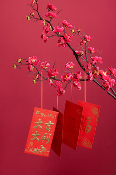 春節(jié)喜慶紅包飾品紅色背景圖