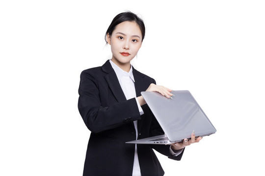 商務女性手持筆記本電腦