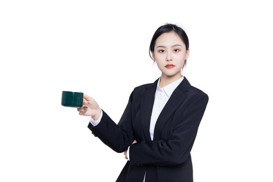 手持茶杯的美麗商務(wù)女性