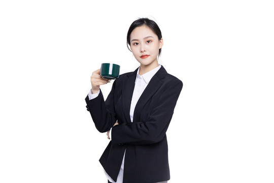 手持茶杯的美麗商務(wù)女性