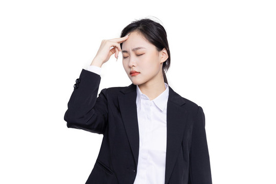 商務(wù)女性手扶額頭