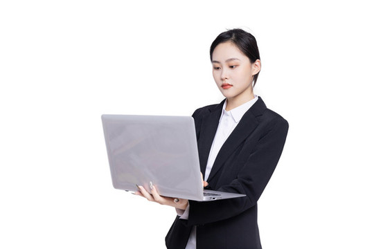 商務(wù)女性手持筆記本電腦