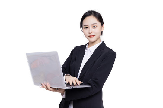 手持筆記本電腦的亞洲商務(wù)女性