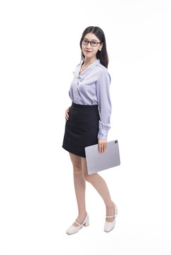 穿著短裙拿著平板電腦的女性