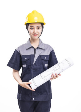 穿著工服拿著工程圖的女工人