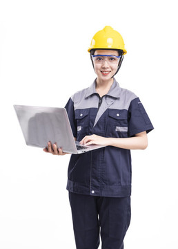 穿著工服帽拿著電腦的女性工人