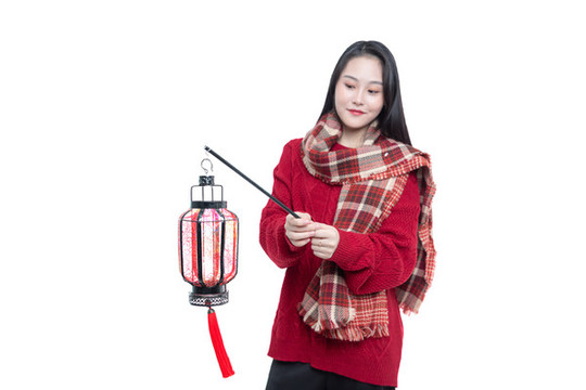 年輕女子拿著燈籠
