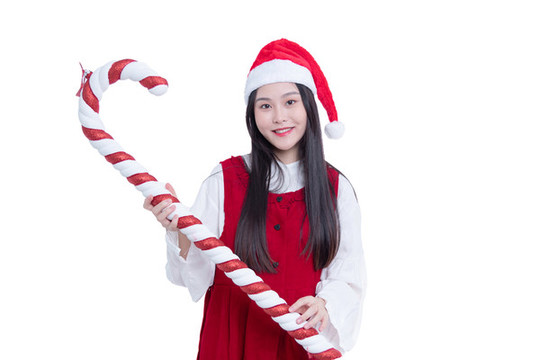 拿著圣誕節(jié)拐杖的美女