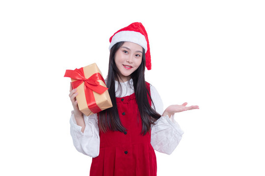 圣誕節(jié)拿著禮盒的年輕女性