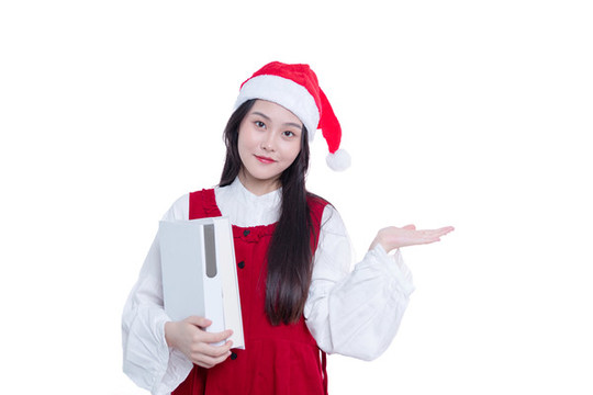 圣誕帽的女學(xué)生懷抱著書本