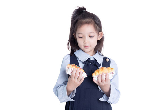 拿美食面包的的學(xué)生裝女孩