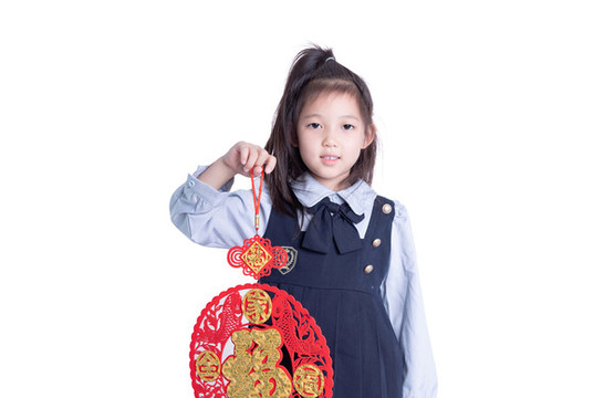 小女孩學(xué)生裝拿著福字的