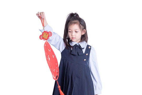 小女孩學(xué)生裝拿著福字的