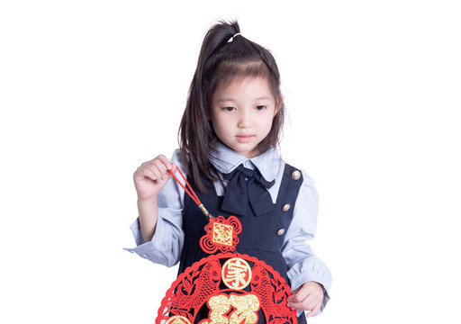 小女孩學(xué)生裝拿著福字的