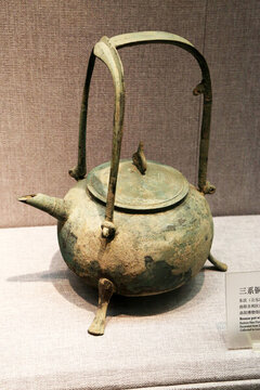 東漢三系銅提梁壺