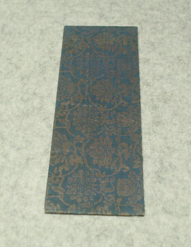 藍(lán)底纏枝花卉紋經(jīng)面