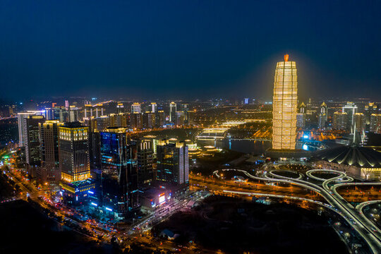 航拍郑州大玉米夜晚繁华都市圈