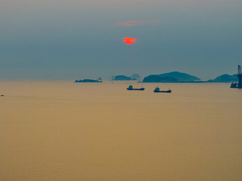 航拍煙臺海濱日出