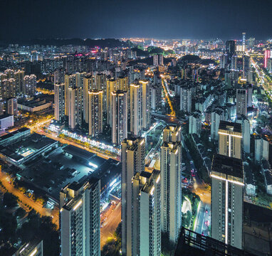 航拍广西柳州夜晚的高层住宅楼